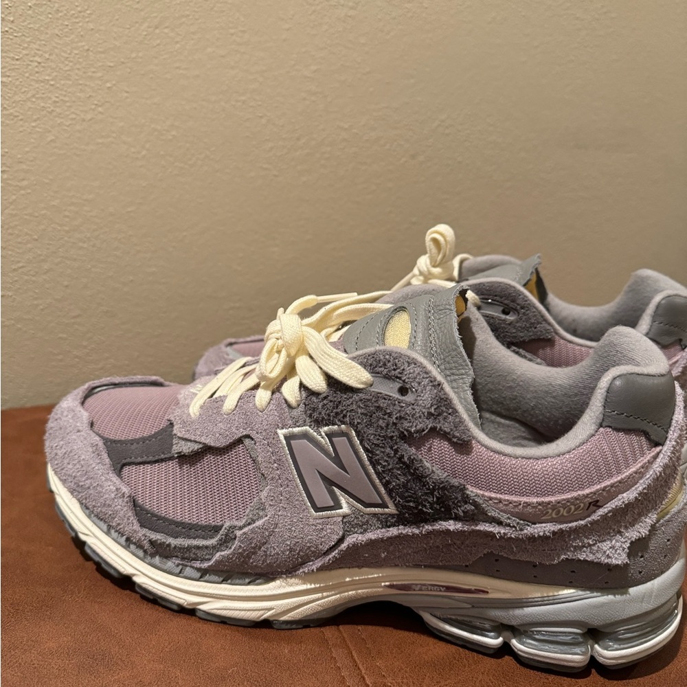 New Balance Sneaker
2002R 'Protection Pack - Lunar New Year'